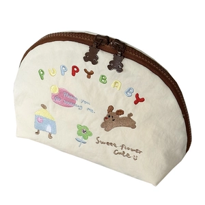 Borsa cosmetica in nylon crema con ricami di cuccioli e doppie cerniere a forma di orso