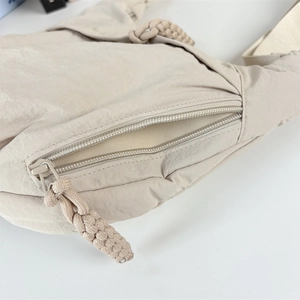 Macro detail of high-quality nylon fabric texture and zipper with braided rope puller