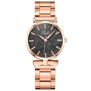 Women's rose gold stainless steel watch with black leaf pattern textured dial by Tadi