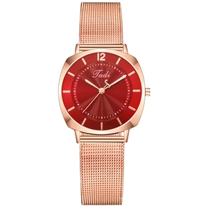 Women's rose gold mesh watch with minimalist red dial and wave pattern design
