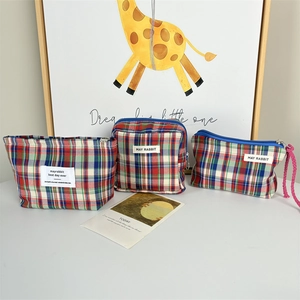 Three-piece set of red and blue plaid cosmetic bags with May Rabbit brand label