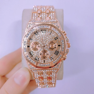 Macro detail of luxury rose gold steel watch with iced-out crystals and Roman numerals