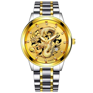 Macro detail of men's watch with golden embossed dragon and diamond markers