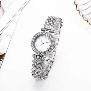 Luxury silver quartz watch for women with full crystal diamonds and white mother of pearl dial