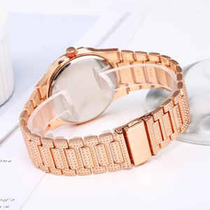 Detail of rose gold hip hop watch strap featuring dense rhinestone pavé craftsmanship