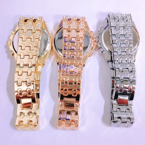 Detailed back view of gold, rose gold and silver luxury quartz watches with rhinestone inlay