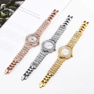 Elegant women's watch set in rose gold, silver and gold with sparkling crystal accents