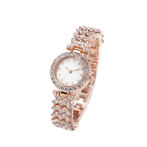 Women's rose gold watch with sparkling rhinestones and a shimmering mother of pearl dial