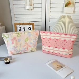 Floral and bow pattern canvas makeup bags with zippers for cosmetic storage