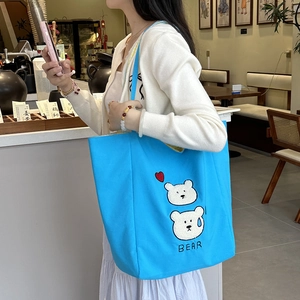 Blue canvas tote bag with white bear embroidery and red heart for daily casual use
