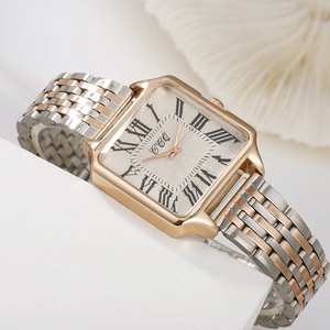 Macro detail of square quartz watch with Roman numerals on elegant stone pedestal