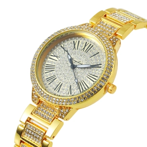 Luxury gold quartz watch with full sparkling crystals and Roman numeral dial