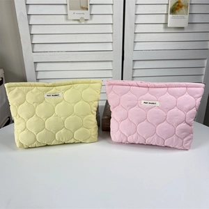 Sweet quilted floral cosmetic bags in pastel yellow and pink with May Rabbit label