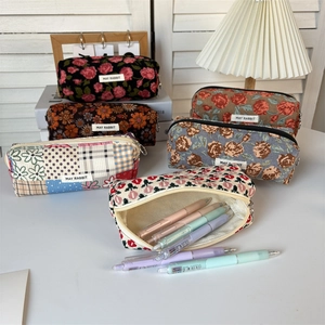 Retro corduroy floral pencil case with large capacity and MAY RABBIT label in warm light