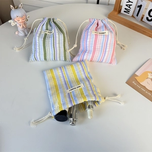 Lot de trois sacs de rangement à rayures avec cordon pour petits articles personnels