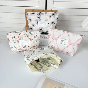 Quilted cotton makeup bag set with floral and bow patterns in four high-capacity designs