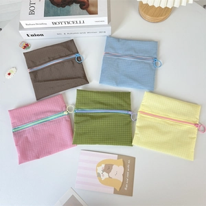 Five-piece set of colorful nylon mini pouches with zippers and circular pull rings