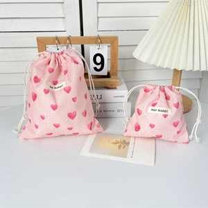 Set of pink heart pattern drawstring storage bags in two sizes for organizing small items