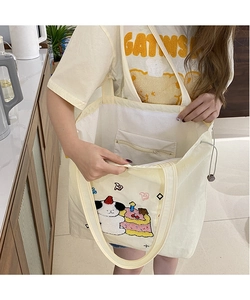 Detailed interior of canvas tote bag featuring secure zipper pocket and quality lining