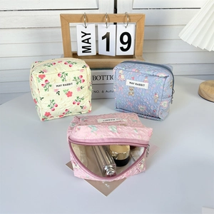 Quilted mini pouches with strawberry and bear prints for cosmetics and lipsticks