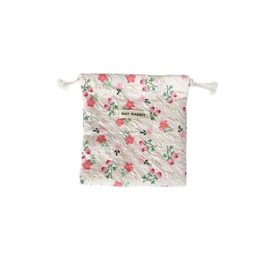 Sacchetto a fiori con coulisse, trama a bolle ed etichetta May Rabbit su sfondo bianco