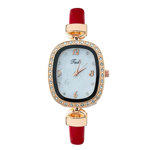 Montre quartz élégante pour femme avec bracelet en cuir rouge et boîtier doré ovale