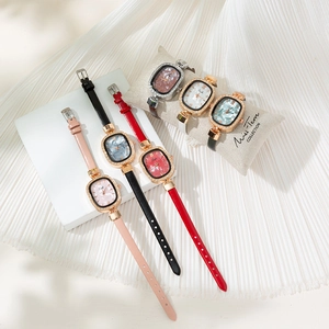 Elegant fashion women quartz watch with shell dial and diamond-set oval leather strap