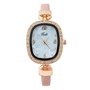 Montre À Quartz Mode Pour Femmes Boîtier Ovale En Alliage Strass Cadran Nacre Bracelet En Similicuir Élégante Luxe