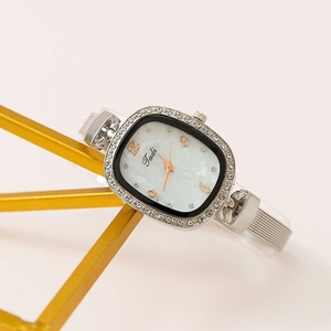 Elegant women's quartz watch with oval shell dial and crystal-set silver mesh strap