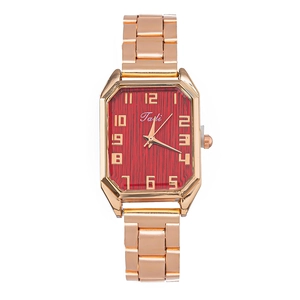 Montre femme en acier or rose élégante avec boîtier octogonal et cadran rouge soleil