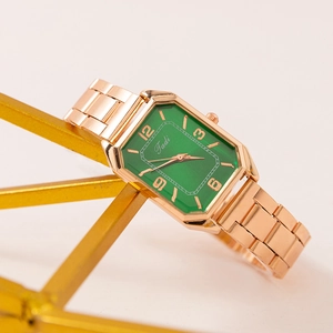 Fashionable rose gold women's watch with emerald octagonal dial and steel band
