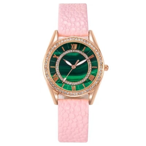 Women's fashion watch with pink leather strap, diamond bezel, and green marble dial
