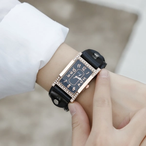 Vintage rectangular quartz watch for women with rose gold diamond bezel and black leather strap