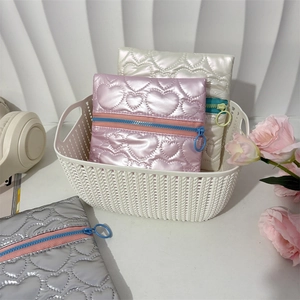 Quilted heart texture satin mini jewelry pouches with contrast zipper and round puller