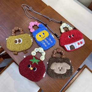 Detailed close-up of cute plush cartoon crossbody bags with various creative character shapes