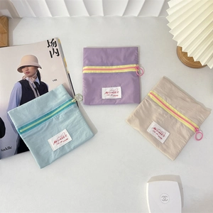 Minimalist macaron color canvas pouch with round metal ring zipper for jewelry storage