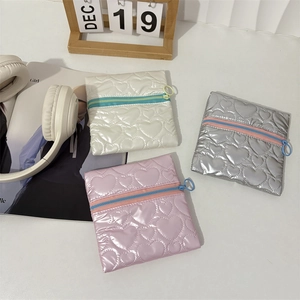 Quilted heart texture PU leather coin purses in white, silver, and pink finishes