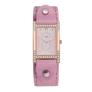 Detail of square rose gold watch with pink leather strap and rhinestone bezel inlay