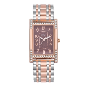 Detail of rectangular women's watch with rose gold silver band and diamond accents