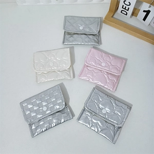 Quilted faux leather coin purses in silver, white and pink with heart pattern and snap buttons