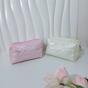 Quilted heart pattern PU leather cosmetic bags in soft pink and pearl white finish