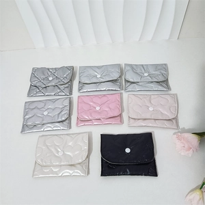 Quilted PU leather mini pouches in silver, pink and cream with heart and star patterns