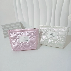 Quilted heart PU makeup bags in pink and white with a stylish minimalist design