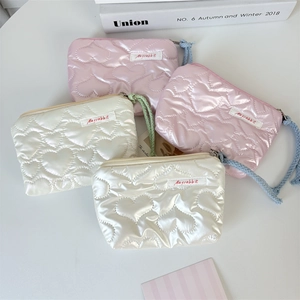 Quilted heart PU coin purse and makeup bag with zipper closure and rope charm