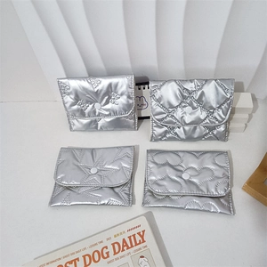 Set of four waterproof silver PU leather coin purses with quilted heart and star patterns