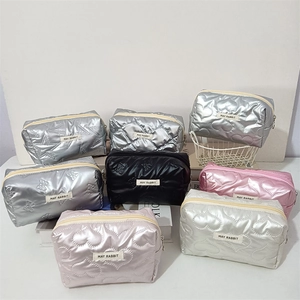 Quilted PU makeup bags in various colors with zipper closure and heart pattern