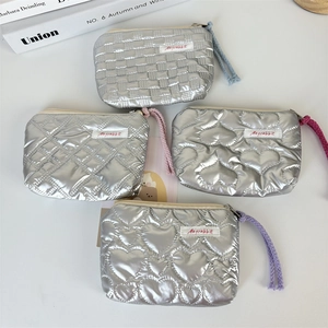 Silver quilted heart coin purse set with colorful zipper pulls and metallic PU finish