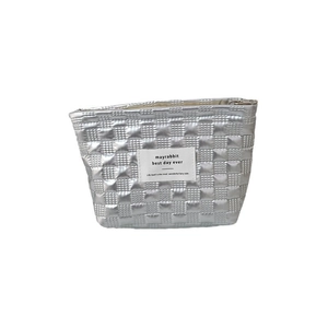 Silver quilted PU makeup bag with metallic finish and top zipper for women