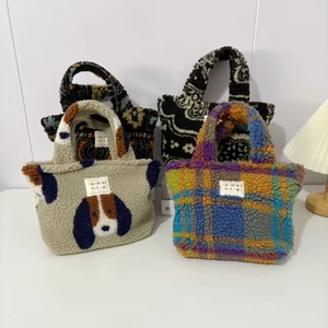 Winter plush lamb wool handbags in various patterns including rainbow grid and ethnic floral
