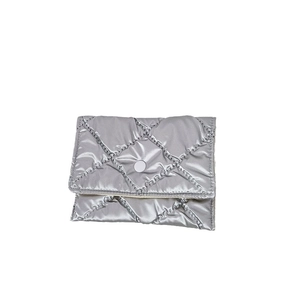Silver quilted diamond pattern envelope clutch bag with metallic snap closure on white background